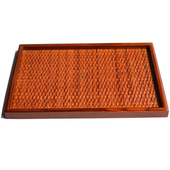 Large rattan tray on a coffee table