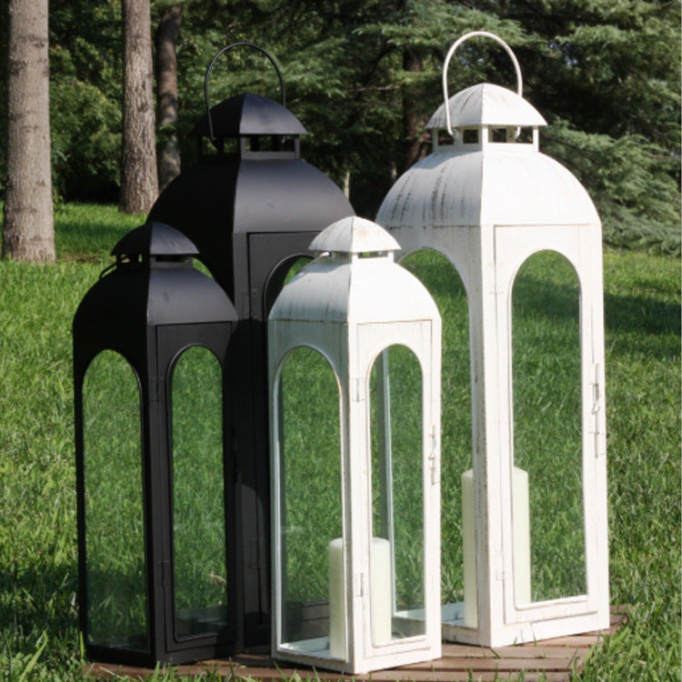 Iron and glass floor storm lantern in black
